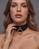 woman wearing a black leather choker collar with O-ring at the front