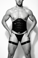 man in black leather corset