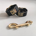 Leather Handcuffs “Cum Slut”